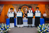 Awarding of degrees to UNIB scholarship recipients in Ecuador.
